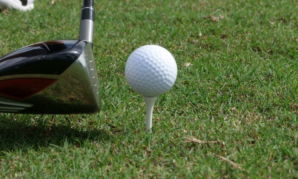 golf tee and ball